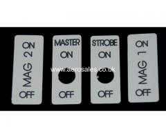 INSTRUMENT BEZELS, SWITCH PLATES AND LABELS